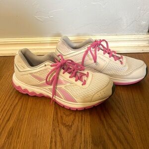 Pink and white Reebok running sneaker, 8.5